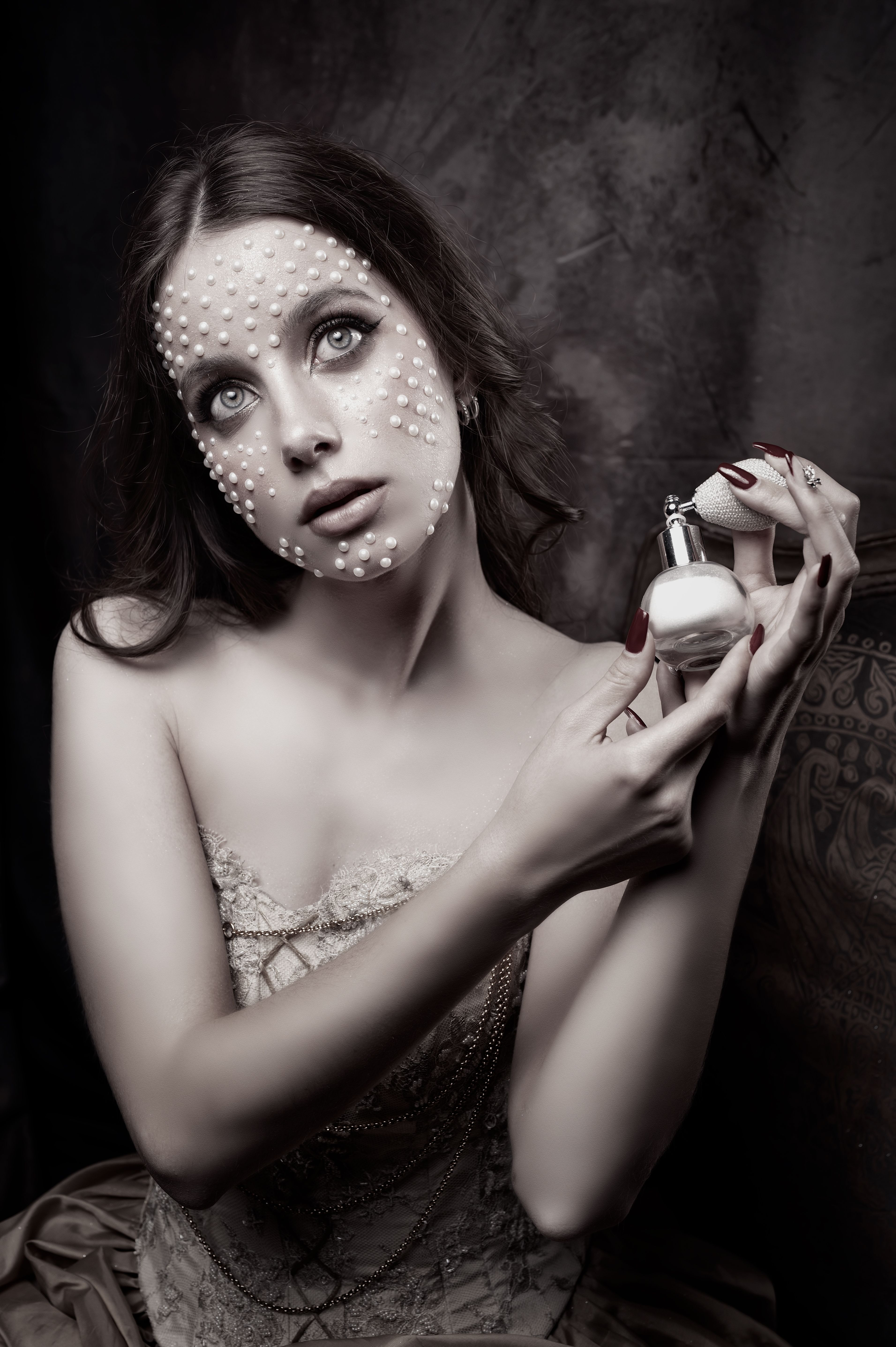 Courtesans Who Became Cultural Icons: The Real Reason History Still Remembers Them 1 Sepia portrait of a courtesan wearing pearls and holding a perfume bottle